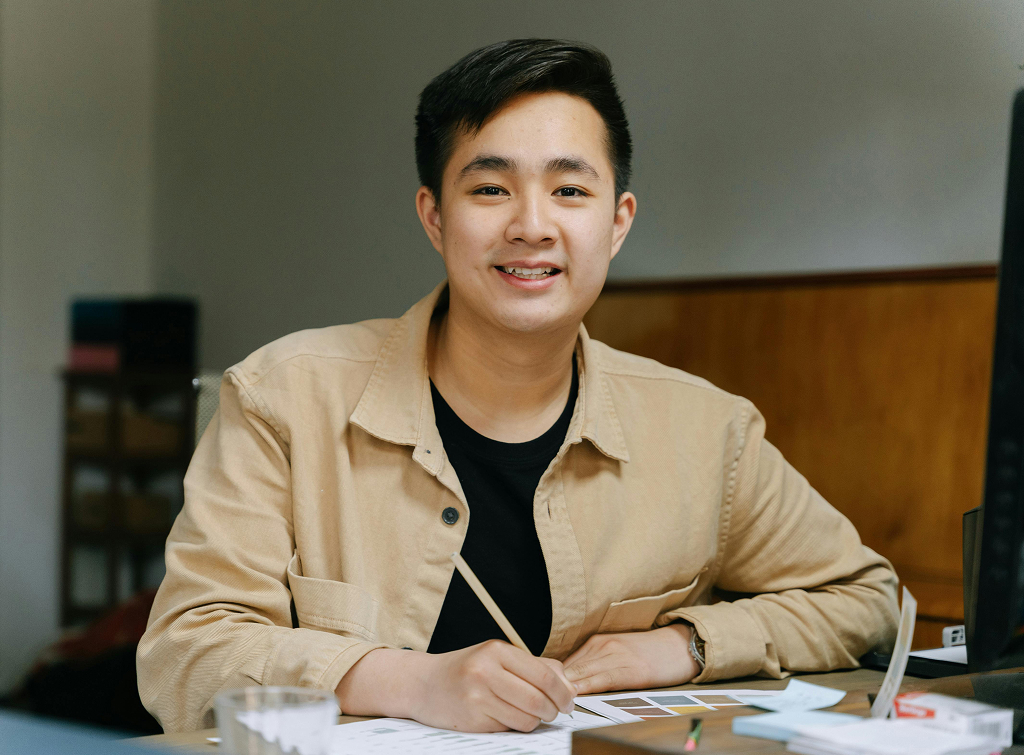 Offshore team member at their workstation in a professional office setting